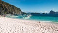 Tourist boats perched on the beautiful white sand beach, El Nido, Philippines. Royalty Free Stock Photo