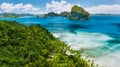 El Nido, Palawan, Philippines. Panoramic aerial view of exotic tropical Pinagbuyutan island, blue sea, lagoon and palm Royalty Free Stock Photo