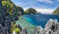 El Nido, Palawan, Philippines. Tapiutan strait with tourist boats. View from Matinloc island located in Bacuit Archipelago Royalty Free Stock Photo