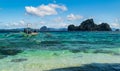 El Nido, Palawan, Philippines tour boats moored in a tranquil bay. Royalty Free Stock Photo