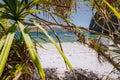 El Nido, Palawan, Philippines. Tropical paradise beach with exotic foliage plants. Blue lagoon surrounds by karst limestone rocky Royalty Free Stock Photo