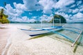 El Nido, Palawan, Philippines. Tropical scenery of banca boat on the sandy beach ready for island hopping tour Royalty Free Stock Photo