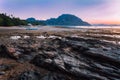 El Nido village with local banca boats on shore lit by sunset light at low tide. Picturesque nature scenery. Palawan Royalty Free Stock Photo