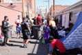 Police controlling cleanup in alley used by immigrants, waiting to get approved to enter the USA. Title 42. El Paso, Texas, USA Royalty Free Stock Photo