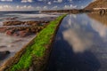 El Pris ocean pool and wall with green moss, Tenerife