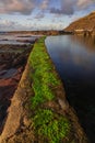 El Pris ocean pool and wall with green moss, Tenerife