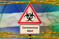 El Salvador flag and Covid-19 biohazard symbol with quarantine orange tape. Coronavirus or 2019-nCov virus concept