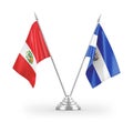 El Salvador and Peru table flags isolated on white 3D rendering