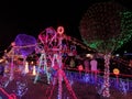 Elaborate Christmas light display with mini Ferris wheel and ski lift Royalty Free Stock Photo