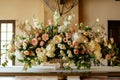elaborate flower arrangement as a centerpiece on a broad table Royalty Free Stock Photo