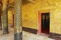 Elaborate golden facade decoration of the Wat Xieng Thong Buddhist temple in Luang Prabang, Laos.