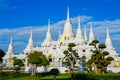 Elaborated white Buddhist Pagoda at Wat Asokaram Temple in Thailand