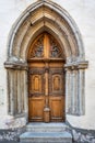 Elaborately carved wooden door in Pikk Street, Tallinn, Estonia