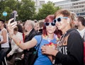 Elaborately dressed participants taking selfie, during Christopher Street Day Parade Royalty Free Stock Photo