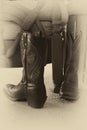 Elaborately Stitched Cowboy Boots by Chair Royalty Free Stock Photo