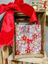 Elaborately wrapped gifts with a bow to decorate a shop window