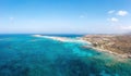 Elafonisi Crete island Greece. Aerial drone view of turquoise transparent sea water pink sand beach Royalty Free Stock Photo