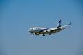 Elal Israel airlines airplane preparing for landing at day time in international airport