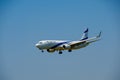 Elal Israel airlines airplane preparing for landing at day time in international airport