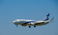 Elal Israel airlines airplane preparing for landing at day time in international airport
