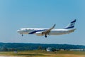 Elal Israel airlines airplane preparing for landing at day time in international airport