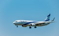 Elal Israel airlines airplane preparing for landing at day time in international airport