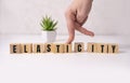 Elasticity word concept on cubes on white background Royalty Free Stock Photo