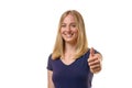 Elated young woman giving a thumbs up Royalty Free Stock Photo