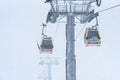 Elbrus, Russian Federation - January 20, 2024: Ski lifts on Elbrus during heavy snowfall Royalty Free Stock Photo