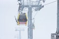 Elbrus, Russian Federation - January 20, 2024: Ski lifts on Elbrus during heavy snowfall Royalty Free Stock Photo