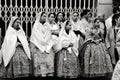 People parading in regional costumes in procession in Elche Royalty Free Stock Photo