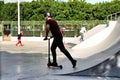 Children practicing skateboard on a skate court