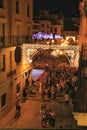 Elche square crowded of people in candle procession on La Roa festivity