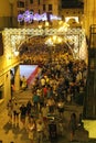 Elche square crowded of people in candle procession on La Roa festivity