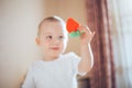 baby child lying on belly weared diaper with teether Royalty Free Stock Photo