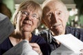 Elder Couple with Bills Royalty Free Stock Photo