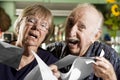 Elder Couple with Bills Royalty Free Stock Photo