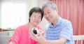 Elder couple measure blood glucose Royalty Free Stock Photo