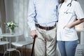 Elder man and his nurse Royalty Free Stock Photo