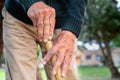 Elder man take care of plants at garden of nursing home for retirement Royalty Free Stock Photo