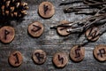 Elder runes or furthark with twigs and a cone, naturally esoteric background