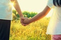 Elder sister and younger sister holds the hand