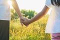 Elder sister and younger sister holds the hand