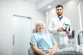 Elder woman with dentist in the dental office Royalty Free Stock Photo