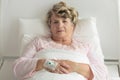 Elder woman with IV drip Royalty Free Stock Photo