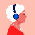 Elder woman listen to music on headphones. Music therapy. GrandmotherÃ¢â¬â¢s profile.
