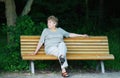Elder woman on park bench Royalty Free Stock Photo