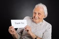 Elder Woman Showing Thank You Card