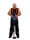 The elder worker with the hipping hammer Royalty Free Stock Photo