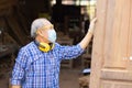 Elder worker wood woodcraft retire hobby for good retirement, Asian male mature professional master of making wooden furniture